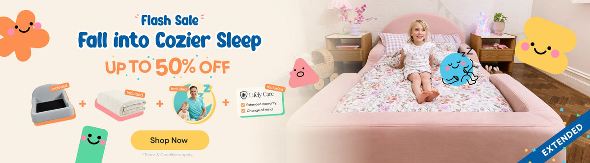 Promotional banner for a children's mattress or bedding set, showing a young girl sitting on a pink bed with a floral-patterned mattress cover and bedding. The left side includes marketing text ('Fall into Cozier Sleep', 'UP TO 50% OFF'), cartoon graphics, and small product illustrations.